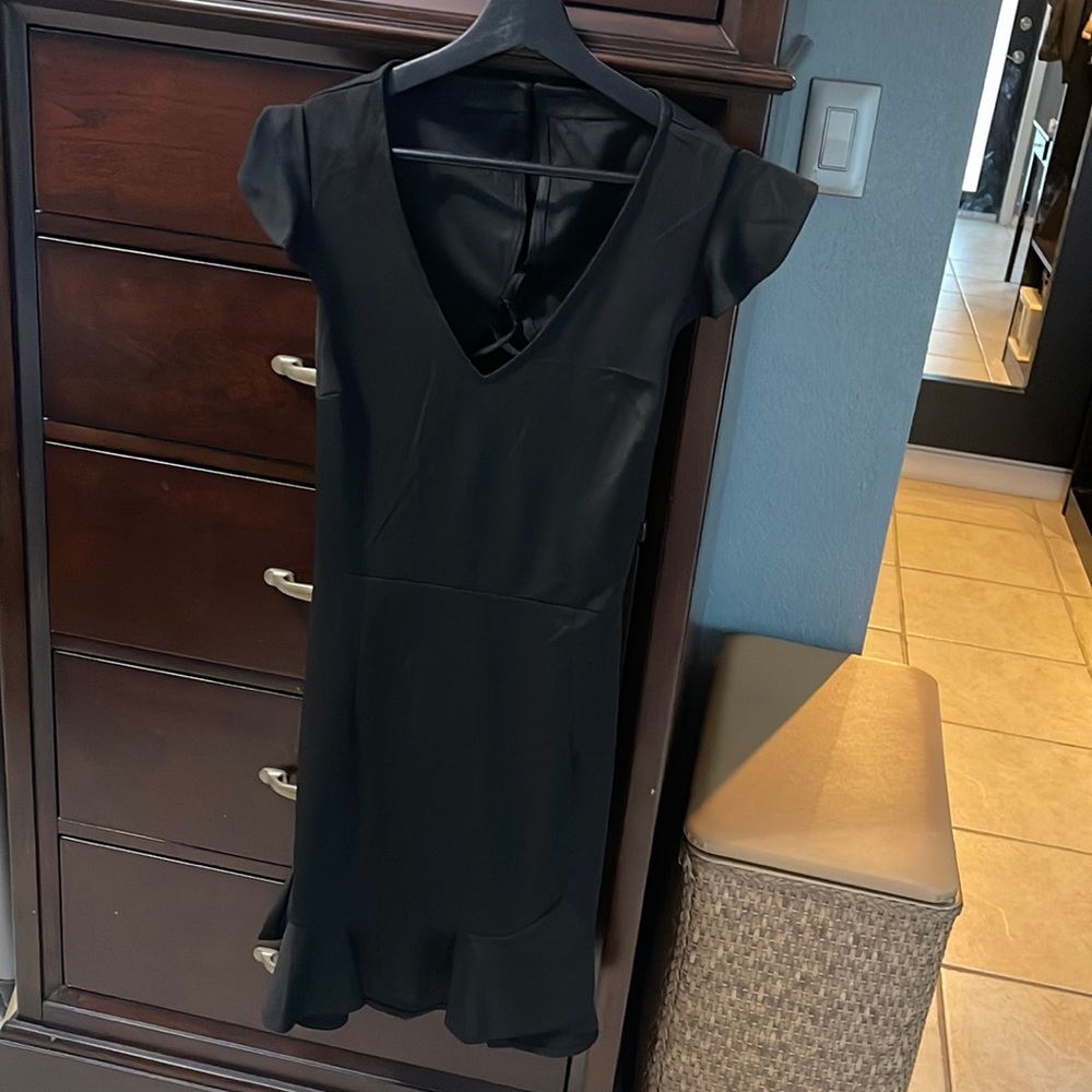 New sexy dress purchased thru Amazon but is too big on me